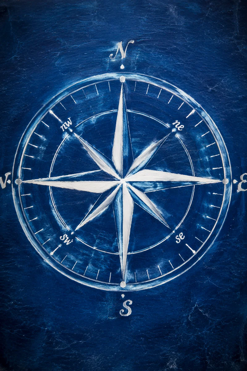 Abstract Nautical Compass Rose on Blue Canvas