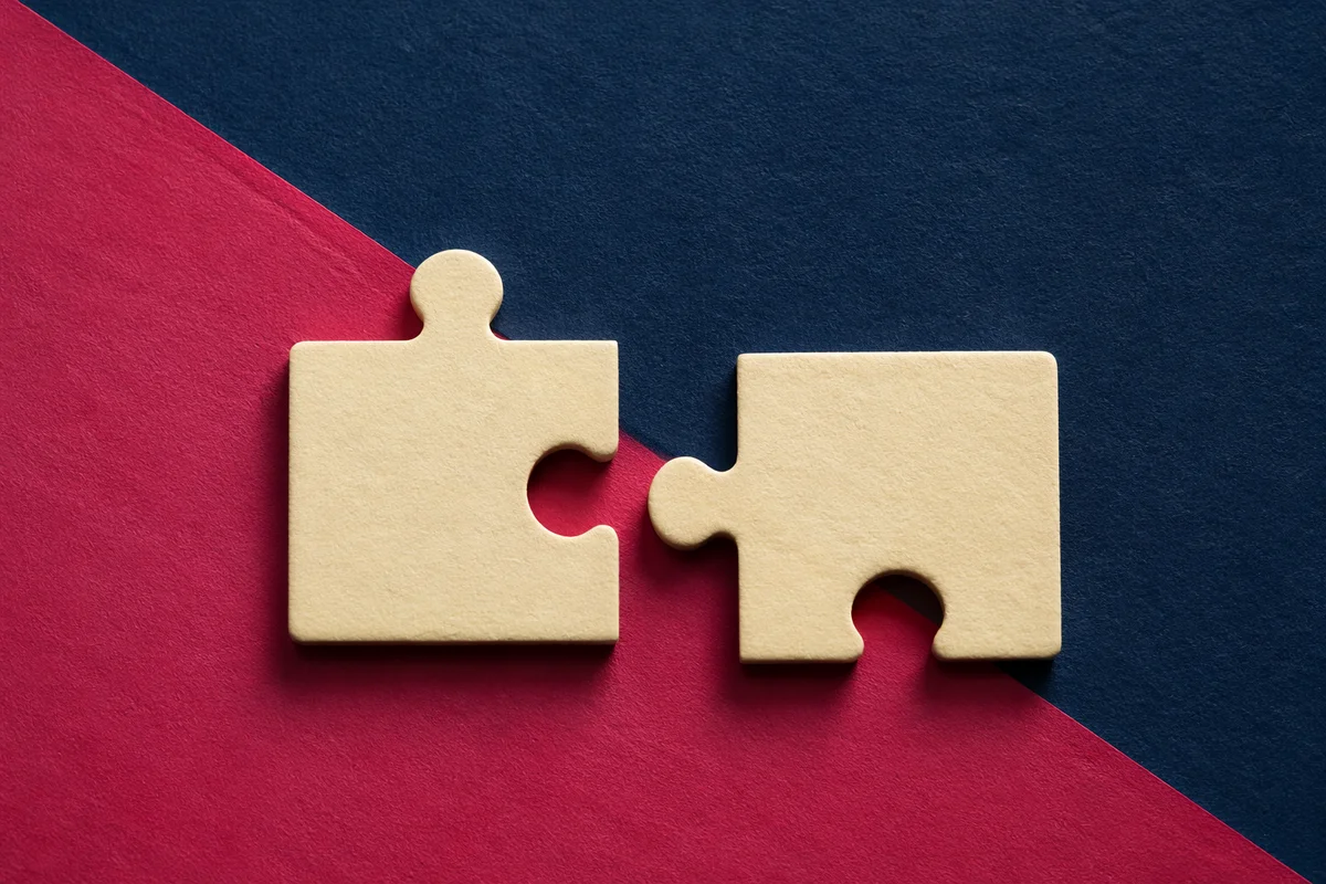 Puzzle Pieces Near Connection for Teamwork