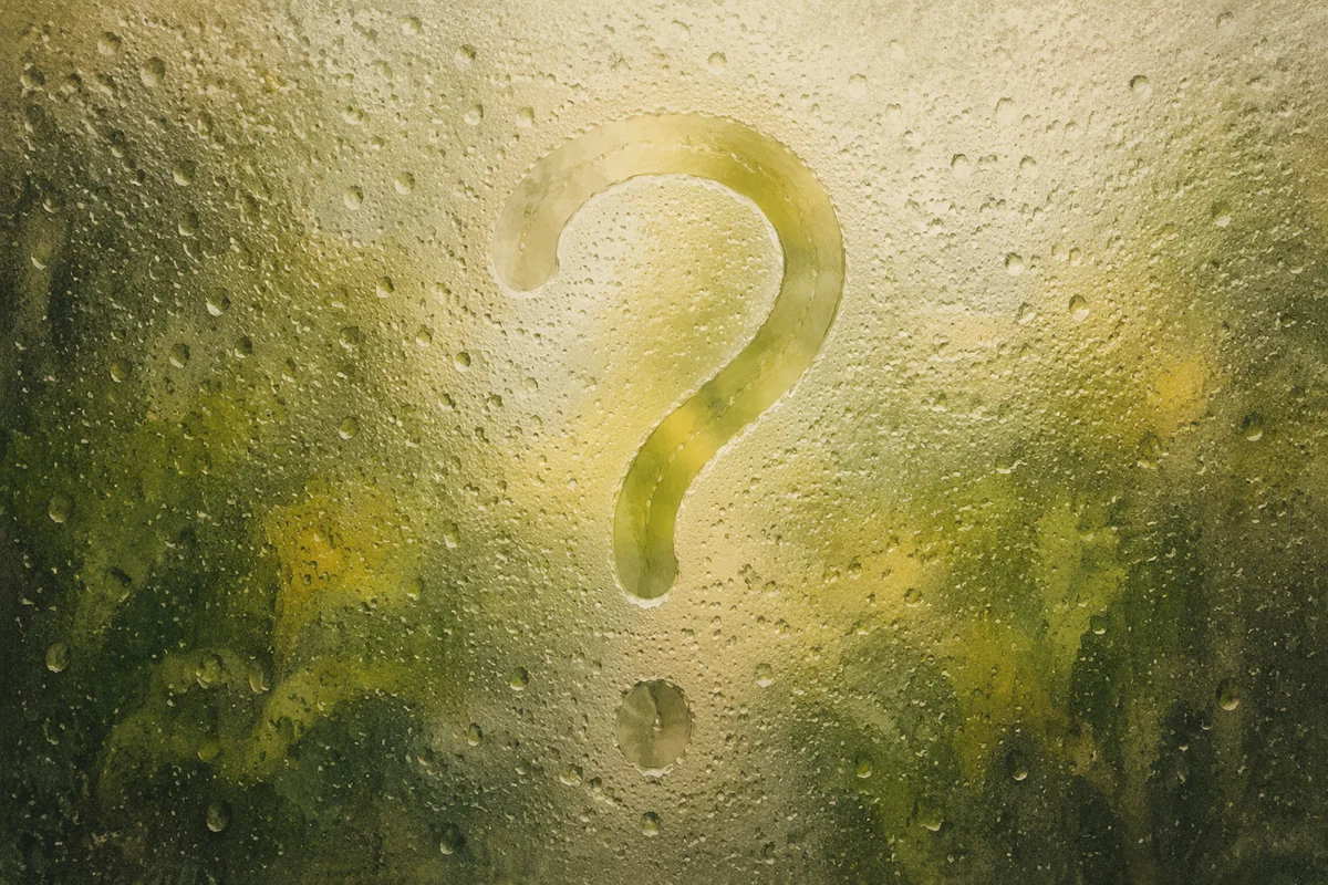 Condensation Question Mark on Misty Glass