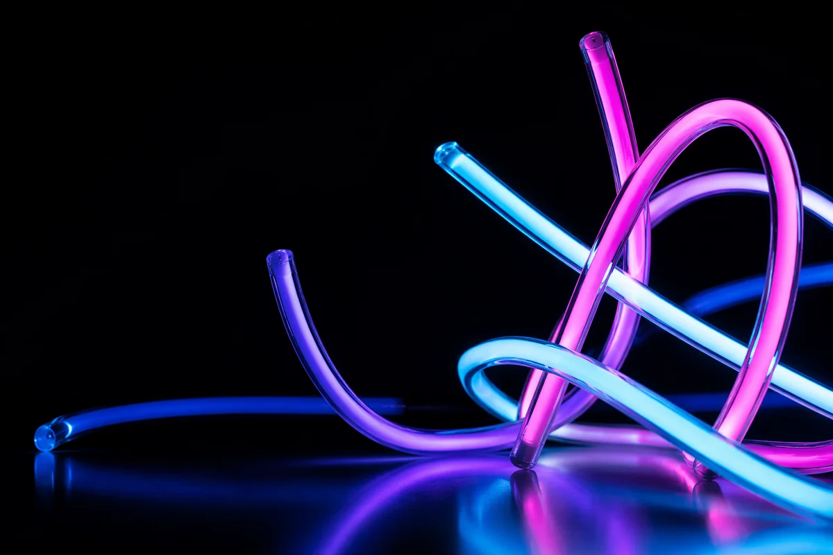 Floating Neon Tubes on Black Background