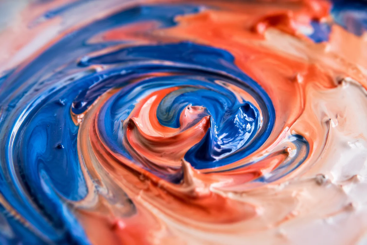 Ultramarine and Coral Paint Swirl Close-Up