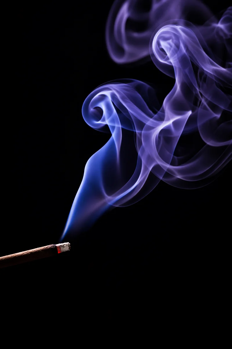 Purple and Blue Smoke Wisps on Black