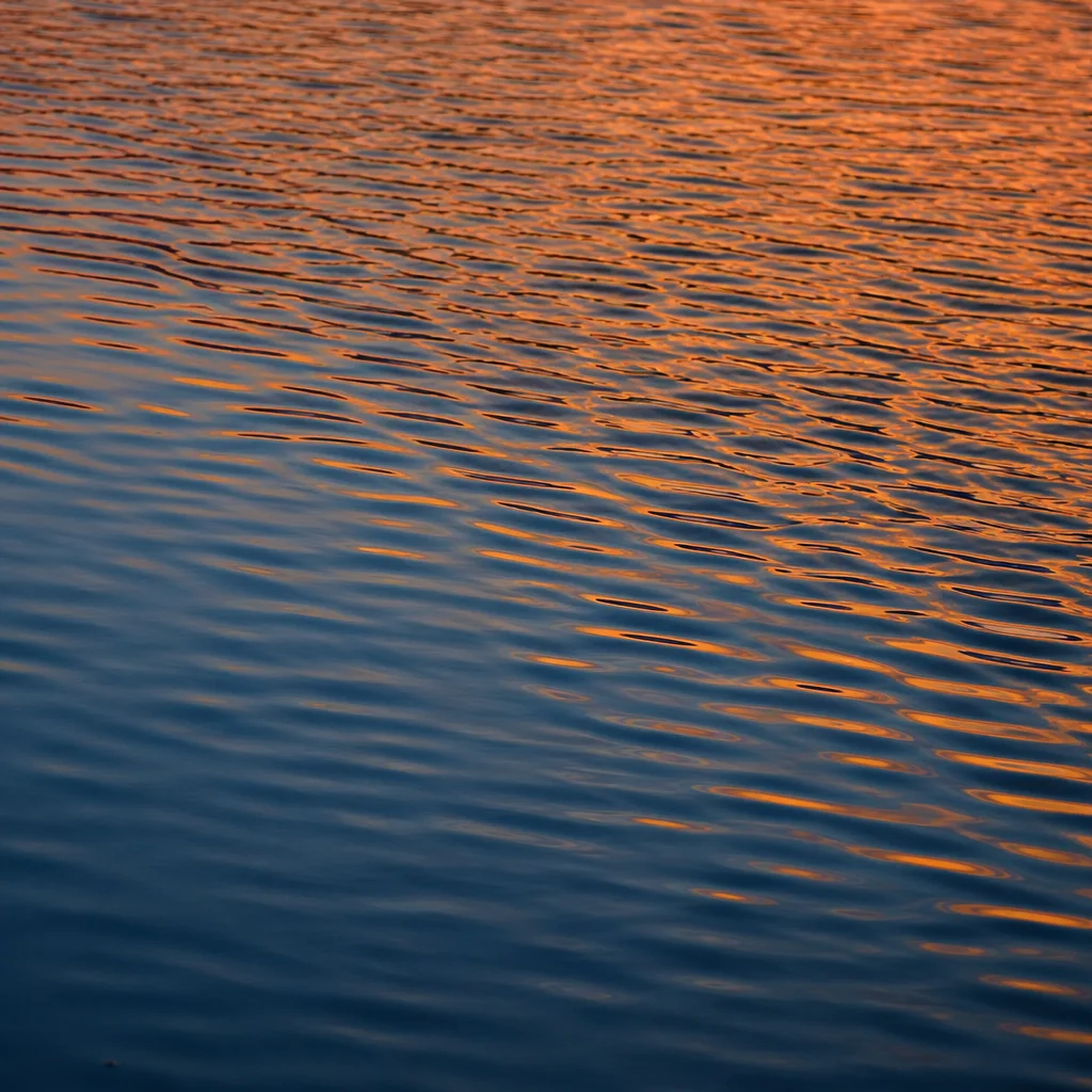 Golden Wave Interference on Blue Water