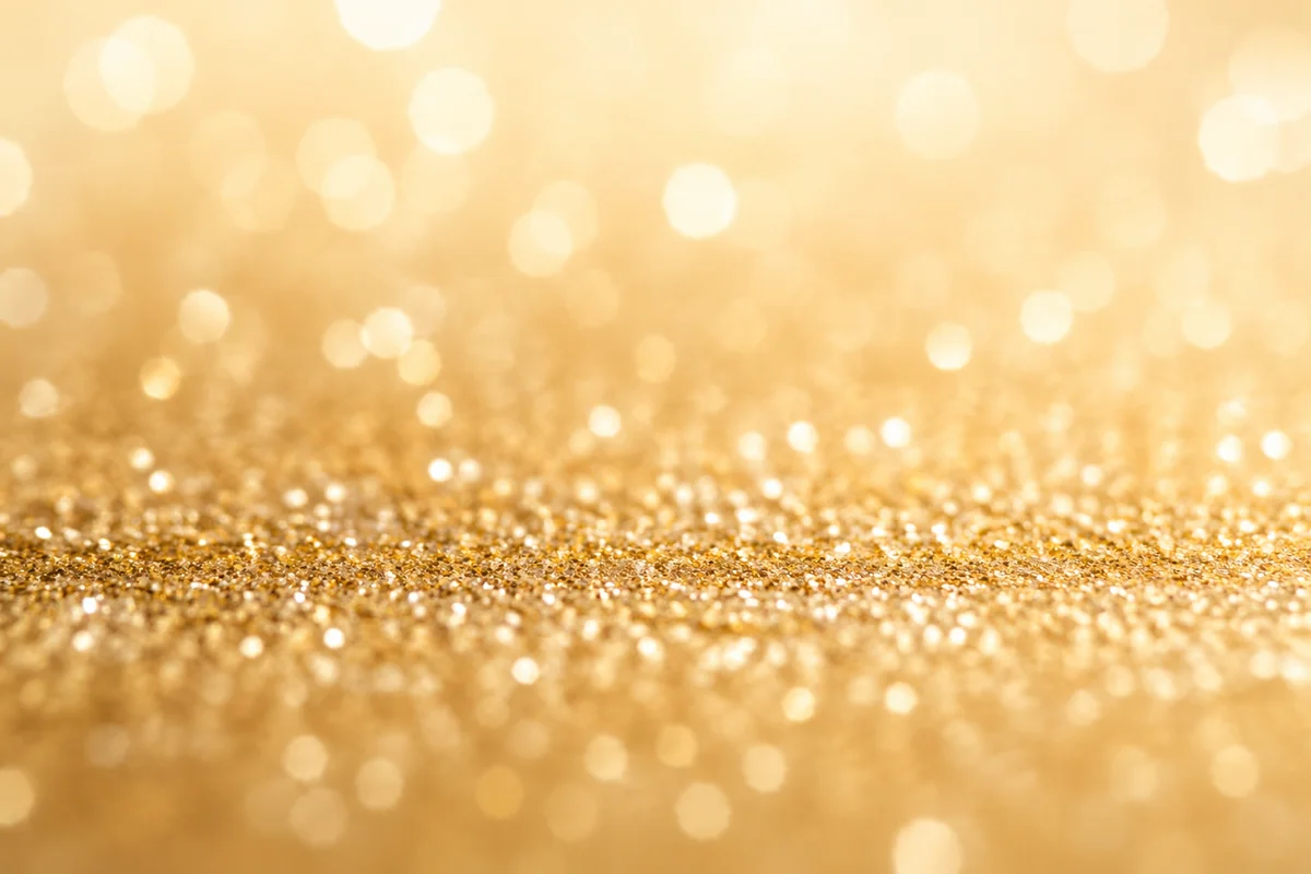 Shimmering Gold and Cream Bokeh Background