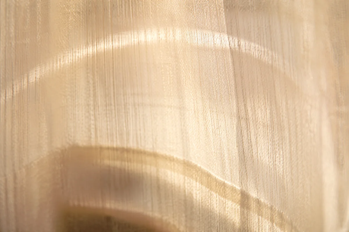 Warm Beige Sheer Fabric Background