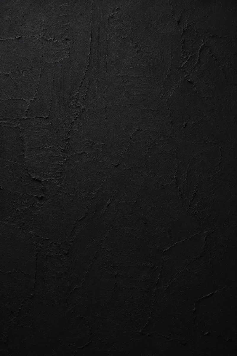 Matte Black Plaster Texture Background