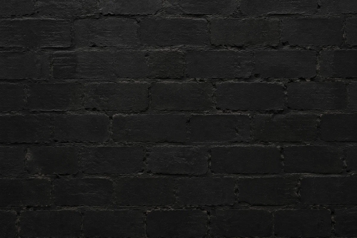 Dark Charcoal Masonry Wall Background