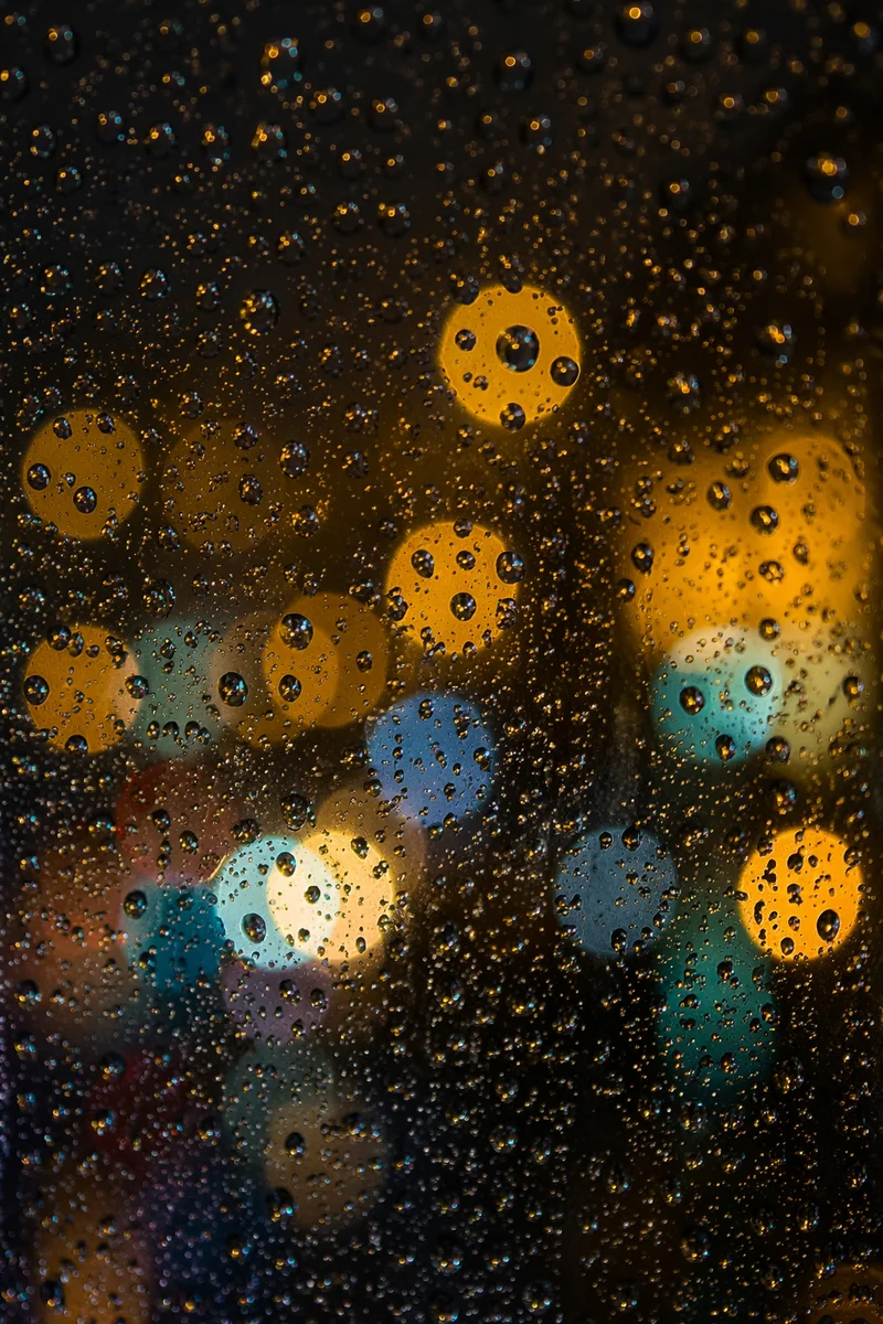 Rainy Night Bokeh Lights Background