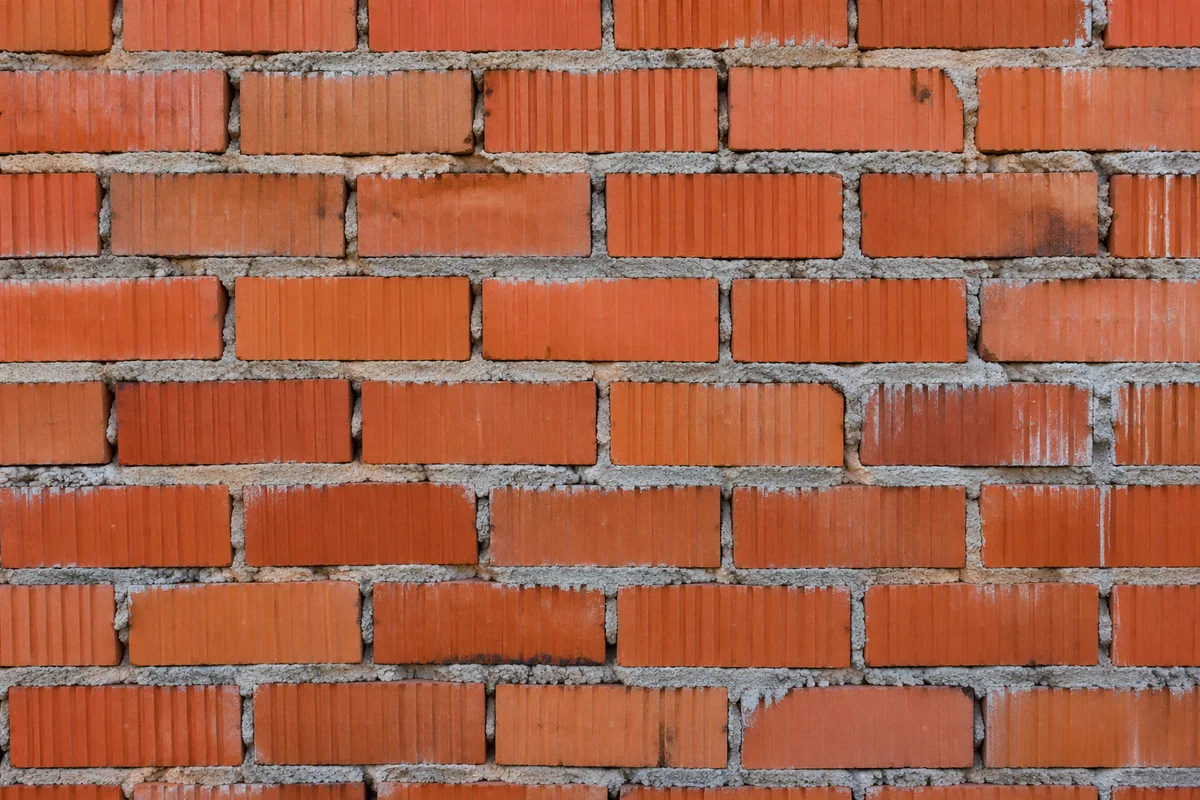 Photorealistic Red Brick Wall Texture Background