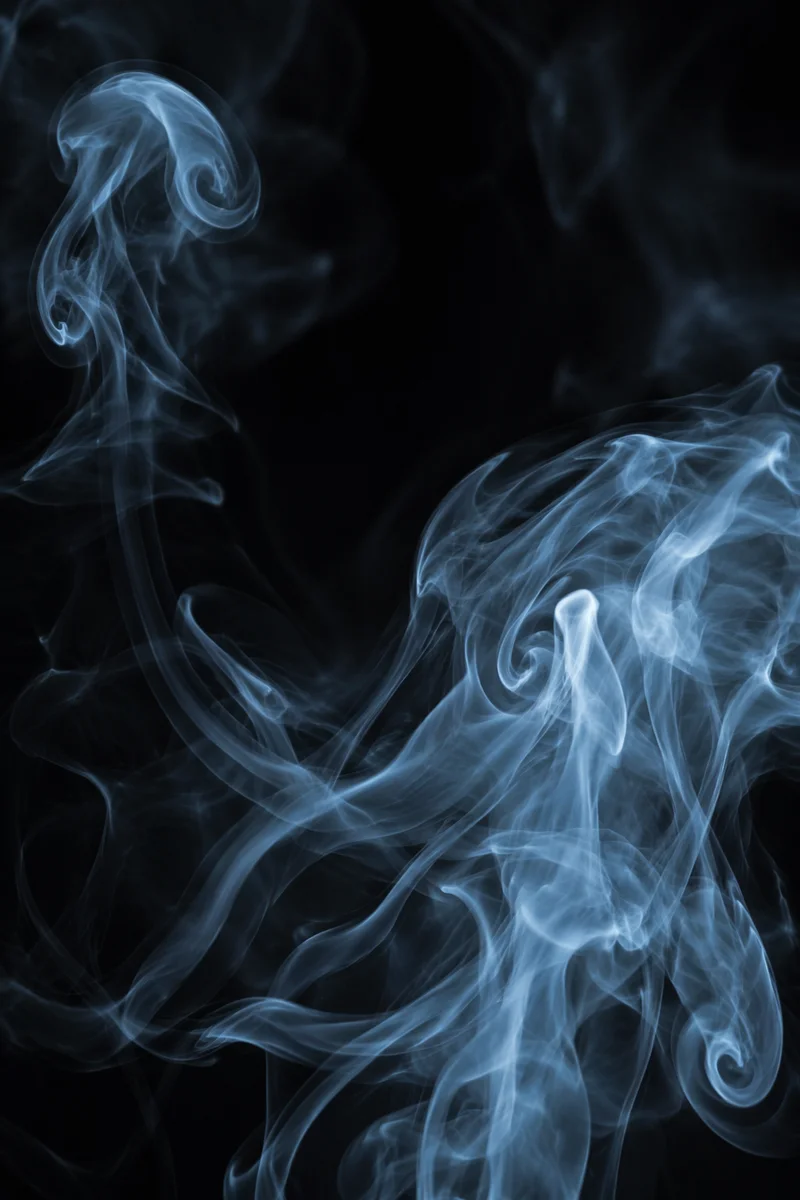 Blue White Smoke on Black Background
