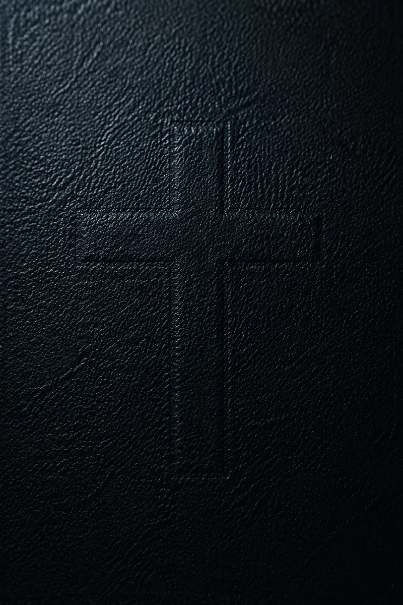 Subtle Cross on Dark Textured Background