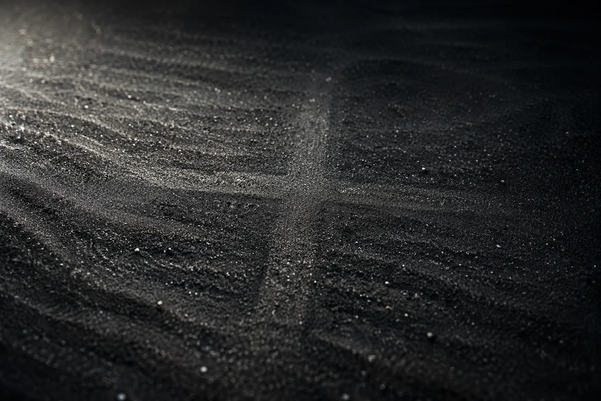 Dark Textured Background with Subtle Cross