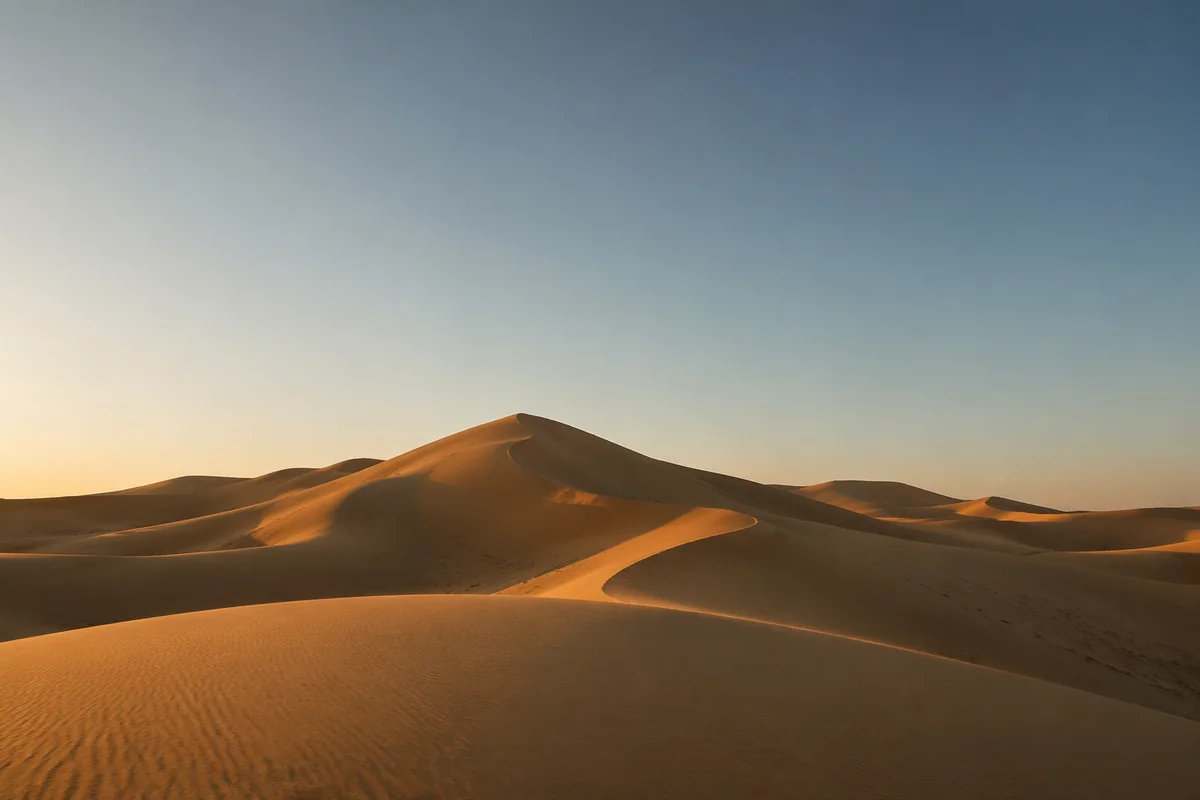 Golden Hour Desert Dunes Under Vast Sky