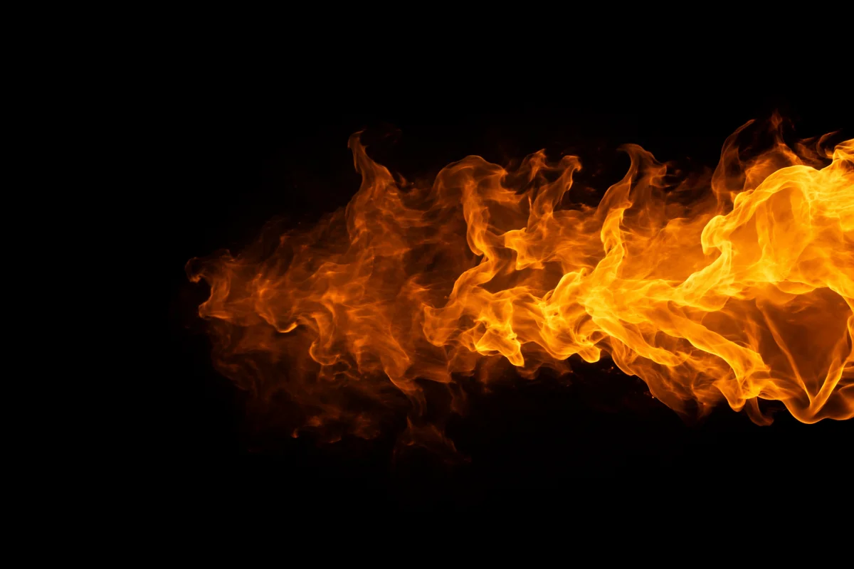 Dramatic Golden Flame Background on Black
