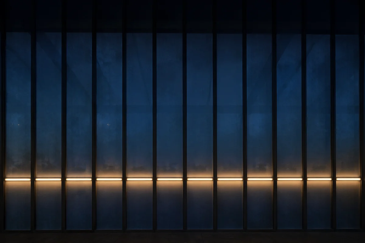 Black Metal Slats Blue Glass Wall