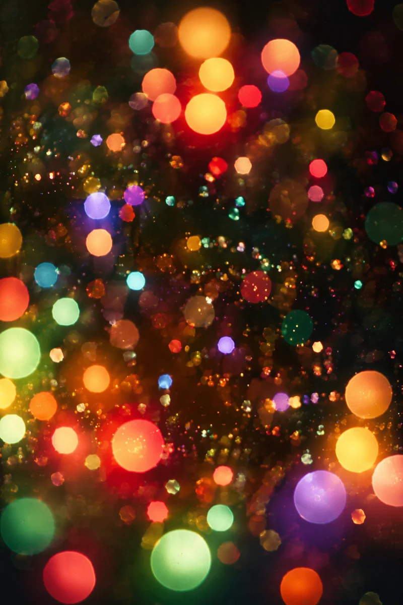 Festive Glitter Bokeh Background on Black