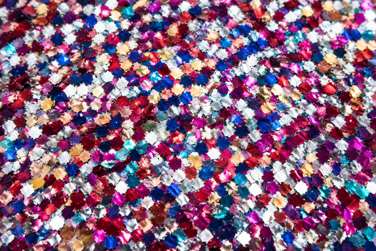 Festive Jewel Tone Confetti Sparkle Background