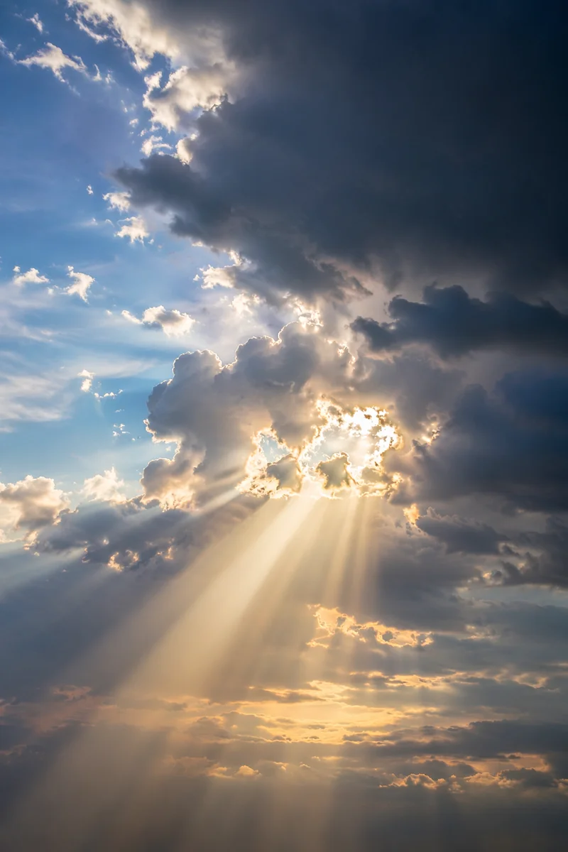 Golden Sunrays Through Heavenly Storm Clouds