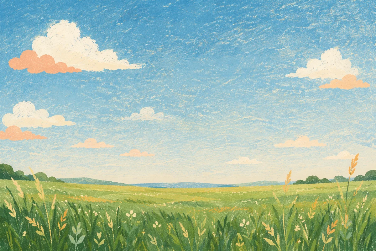 Peaceful Green Field Under Blue Sky