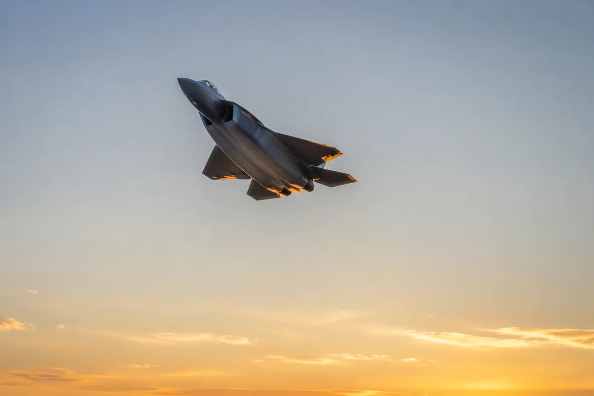 Hopeful Sunrise Jet Climbing Through Clear Sky