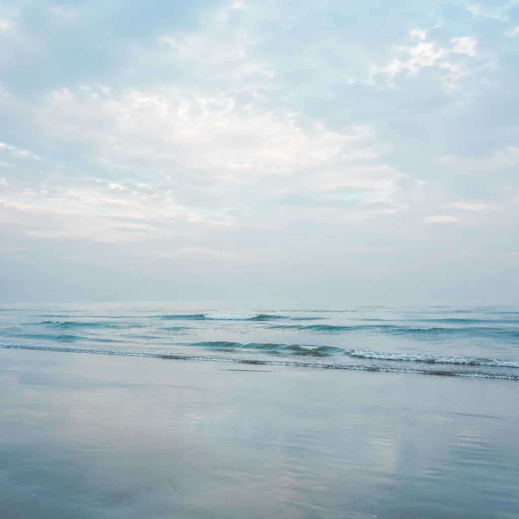 Soft Coastal Blue Background with Misty Sky