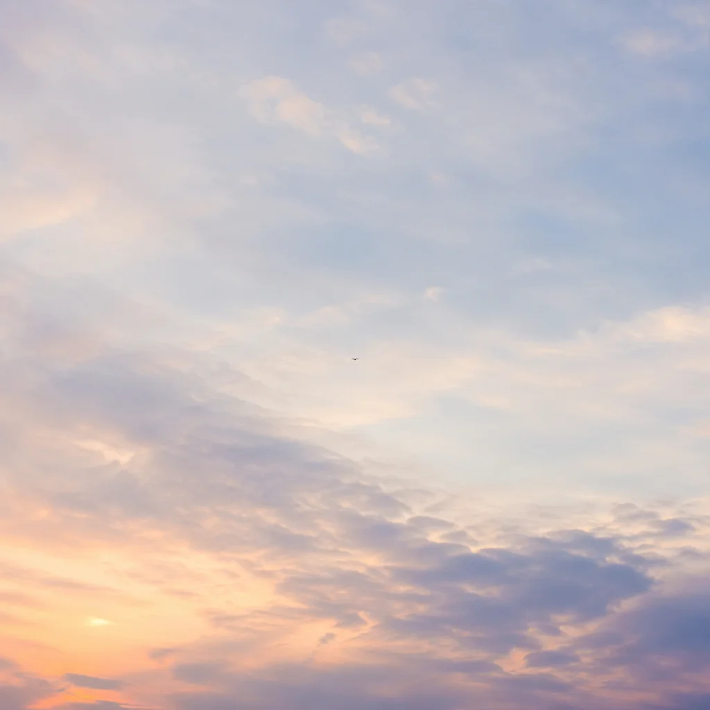 Soft Blue Sky with Layered Clouds