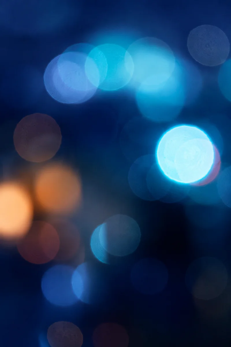 Calming Light Blue Bokeh Night Background