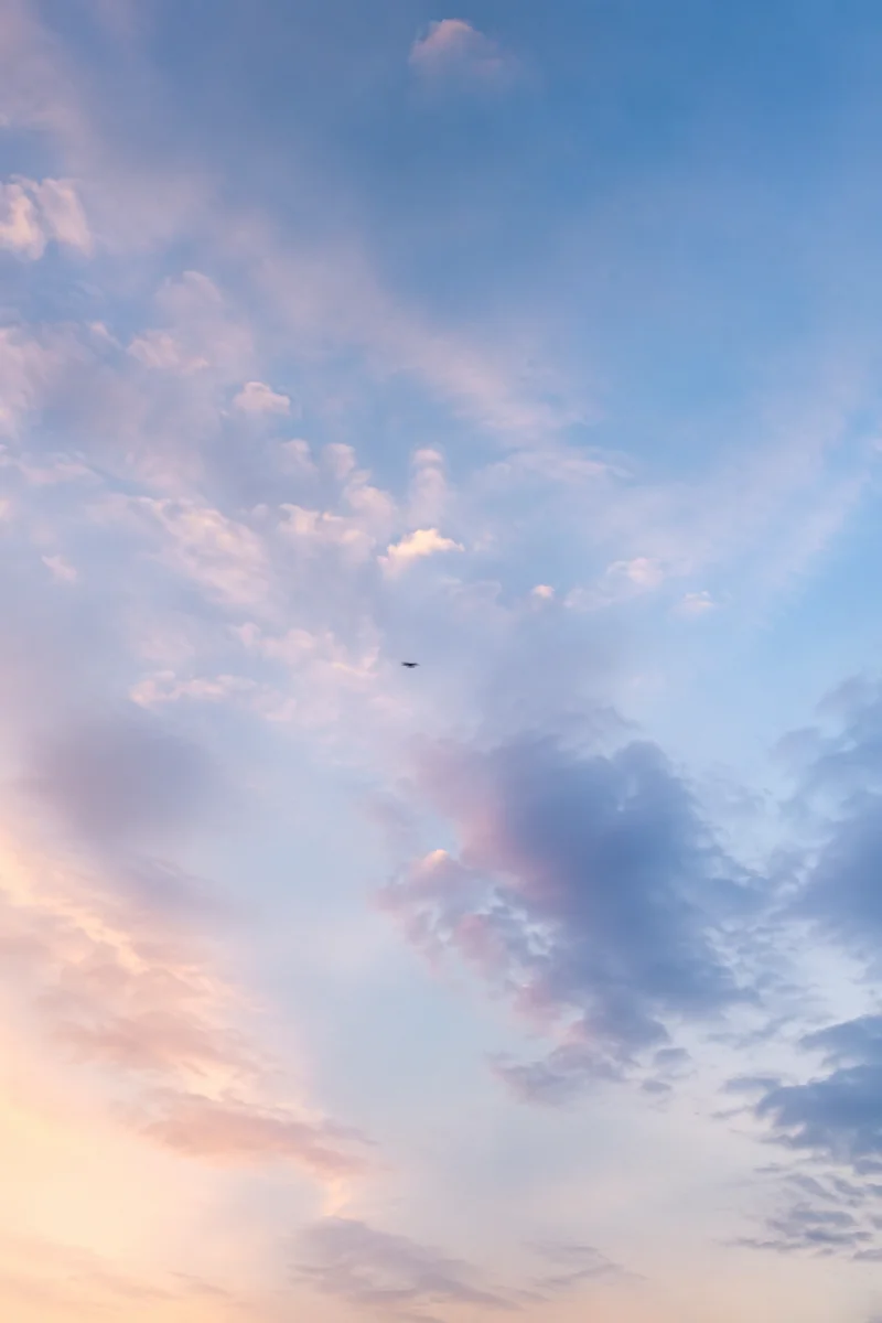 Soft Light Blue Sky with Serene Clouds