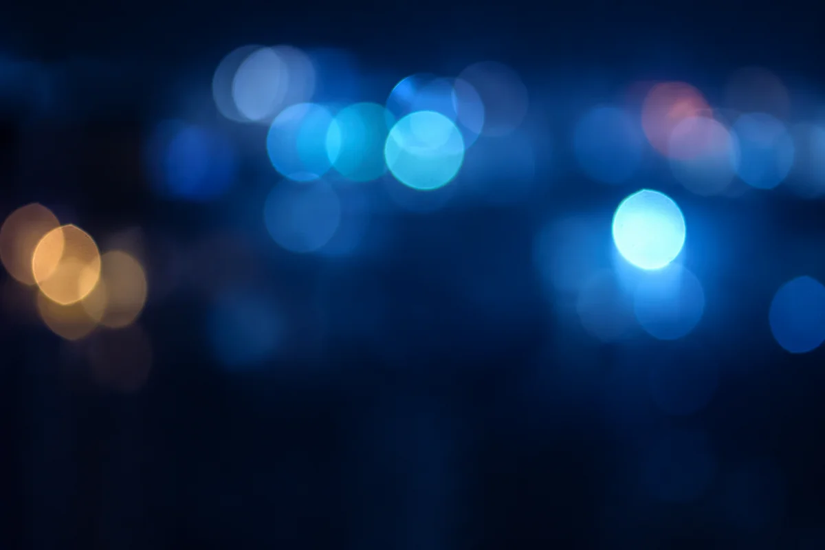 Calming Light Blue Bokeh Night Background