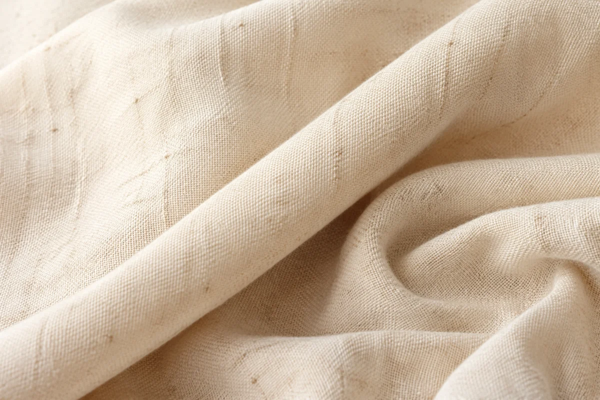 Neutral Cream Linen Folded Fabric Background