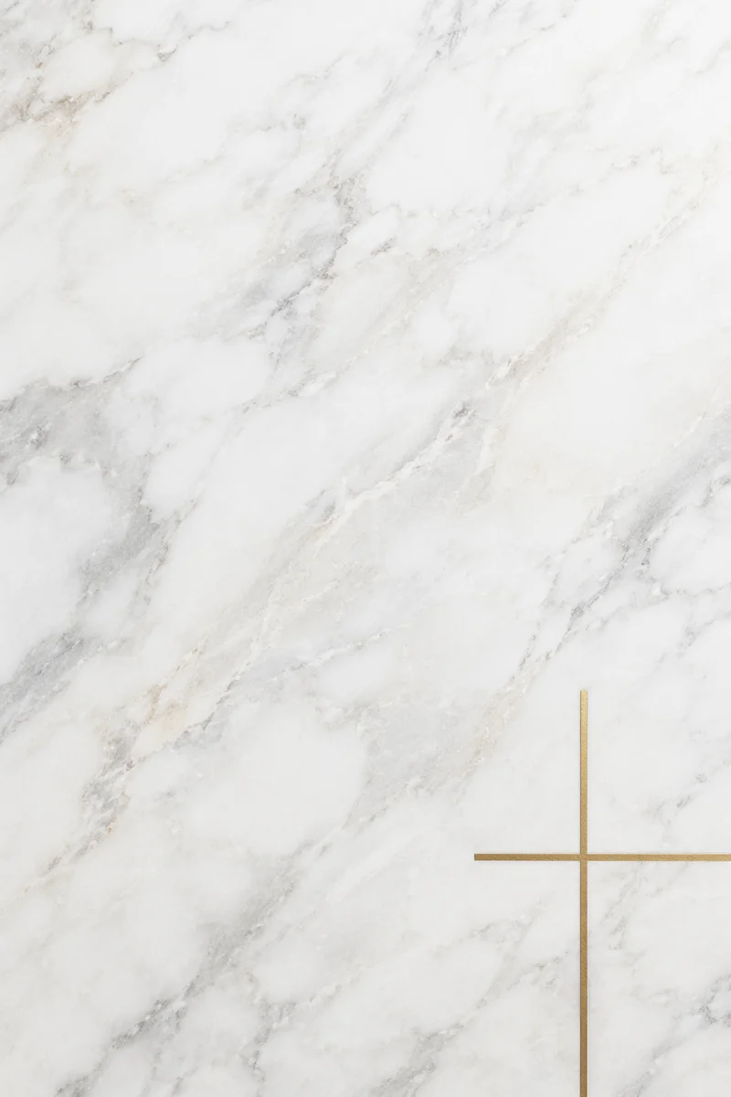 White Marble Background with Gold Cross Accent