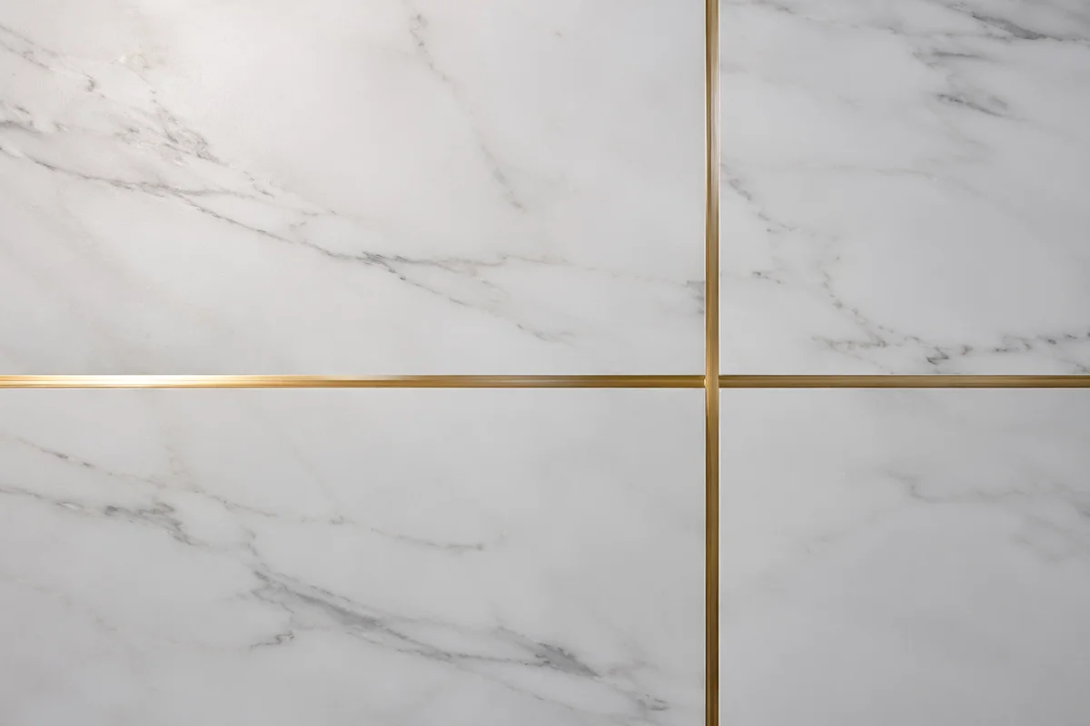 White Marble Background with Gold Cross Accent