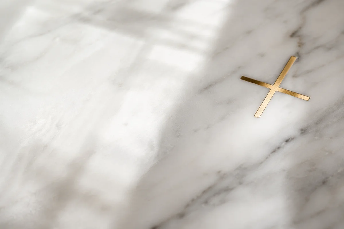 Elegant White Marble with Gold Cross