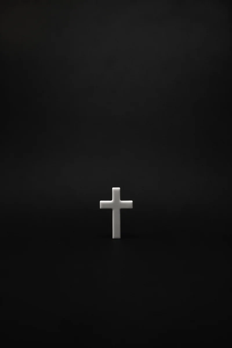 Minimal White Cross on Charcoal Background