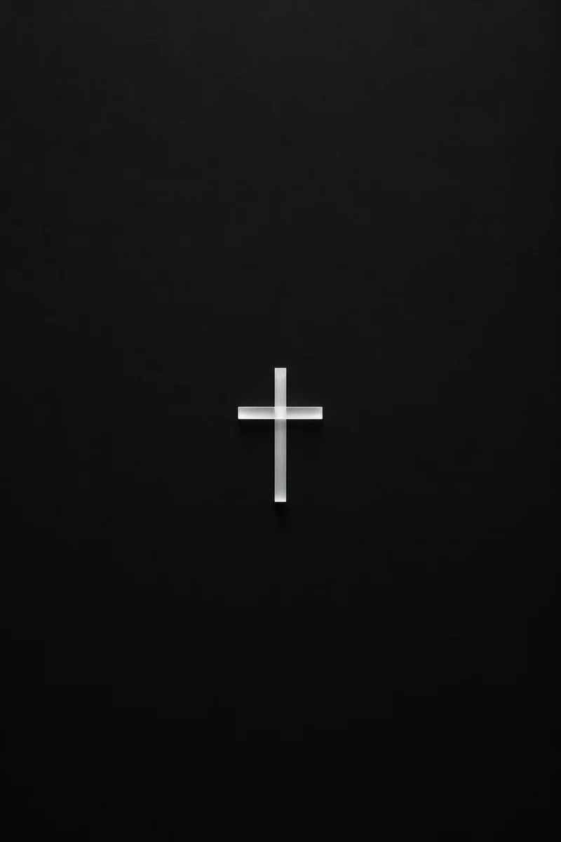 Minimalist Frosted Cross on Charcoal Background