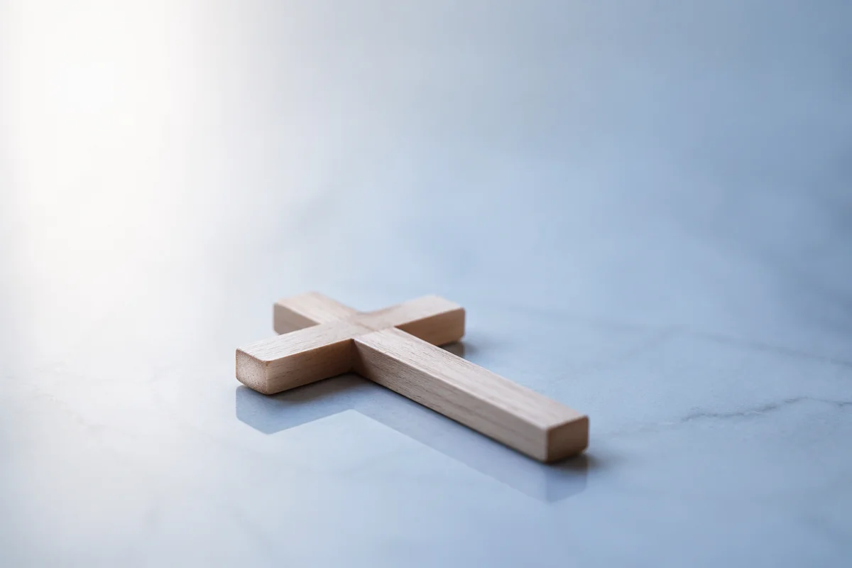 Minimal Wooden Cross on Clean Background