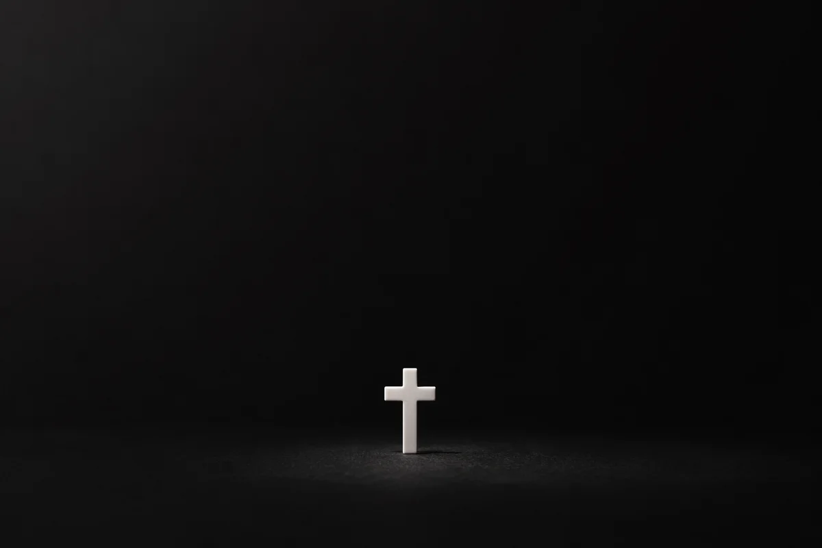 Minimal White Cross on Charcoal Background