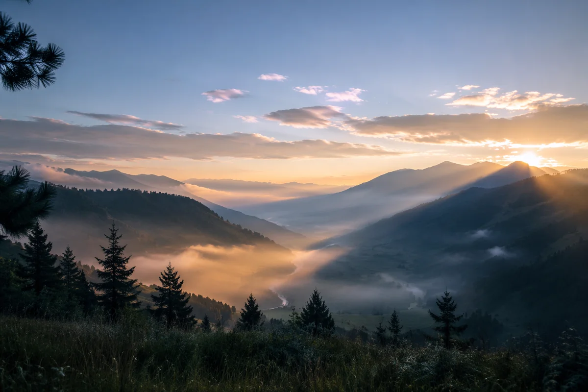 Misty Mountain Valley at Dawn Rays