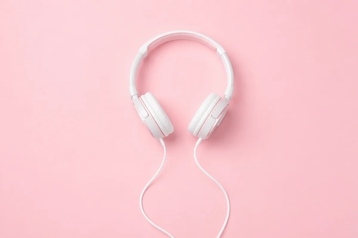 Soft Pink Headphones Flat Lay Background