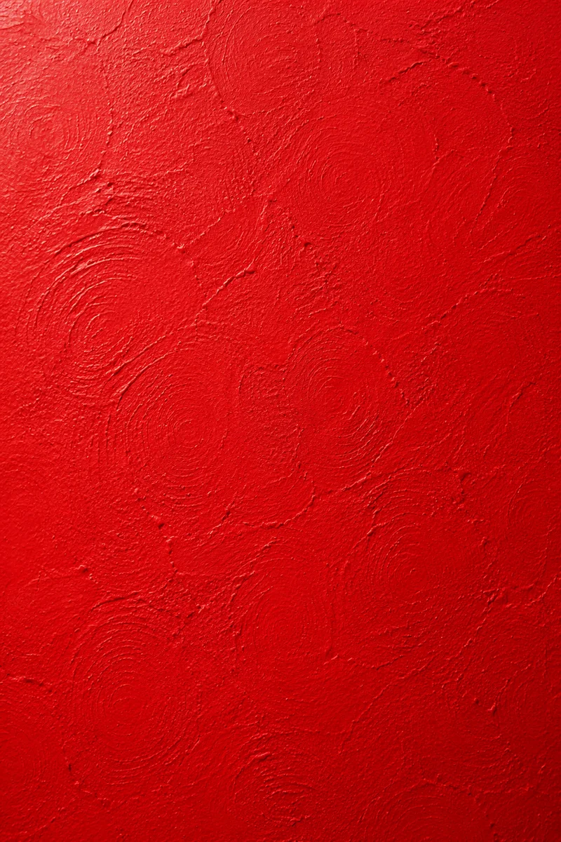 Bold Vibrant Red Painted Plaster Background