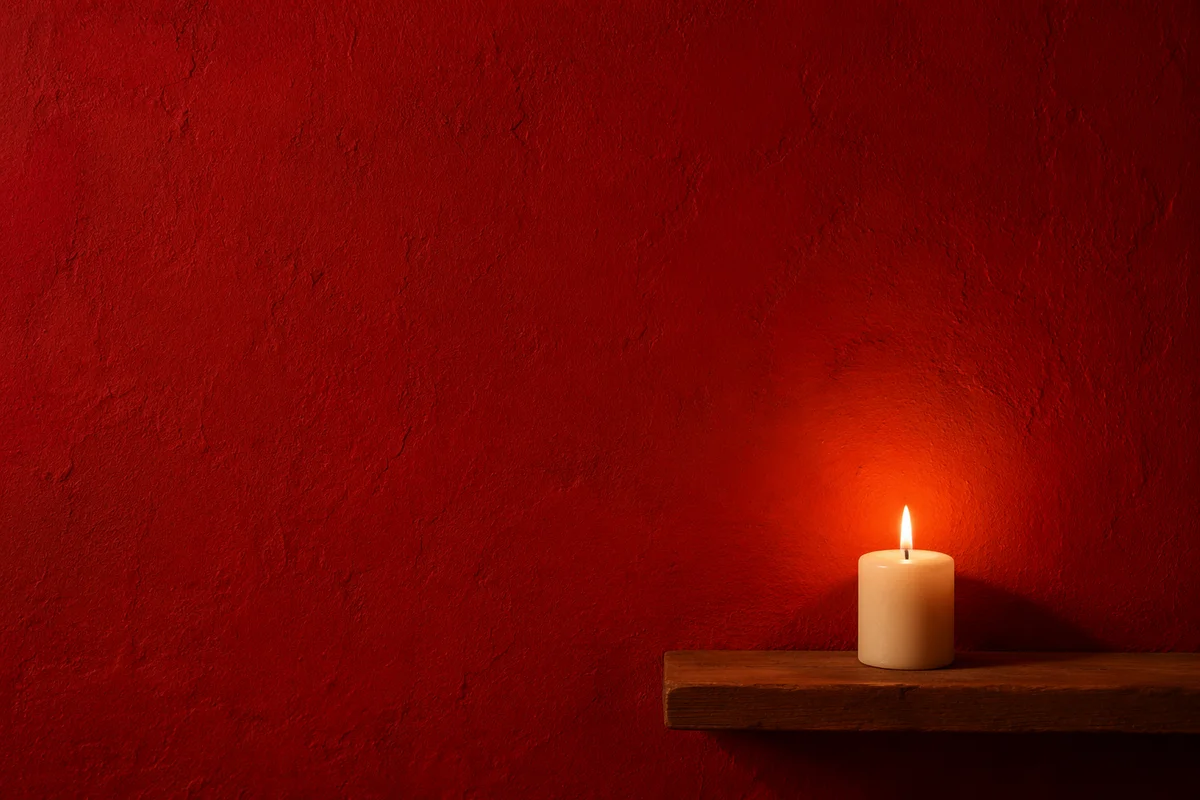 Vibrant Red Prayer Corner With Candle