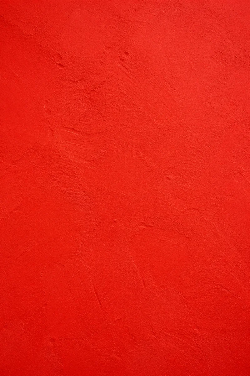 Bold Vibrant Red Plaster Wall Background