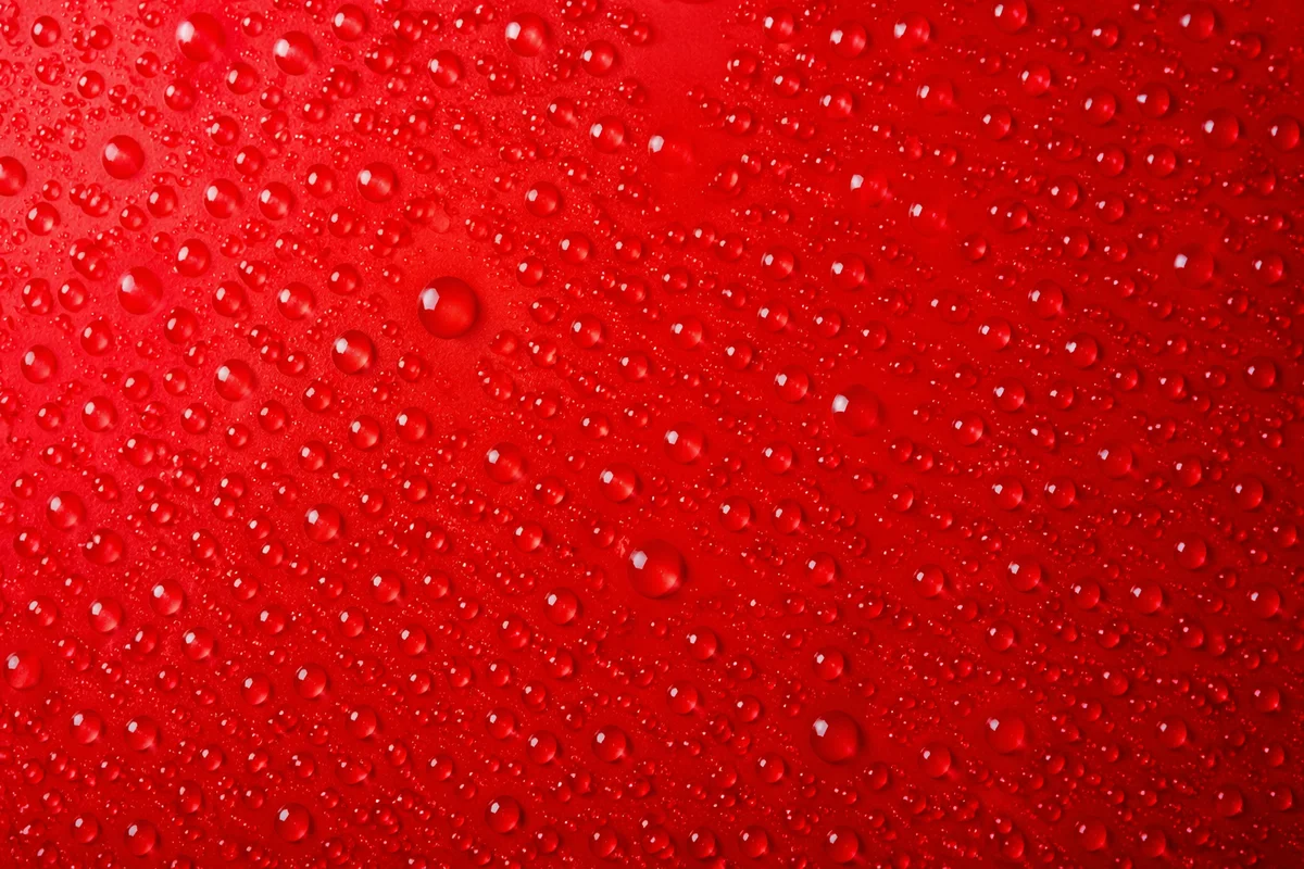Vibrant Red Water Droplet Background