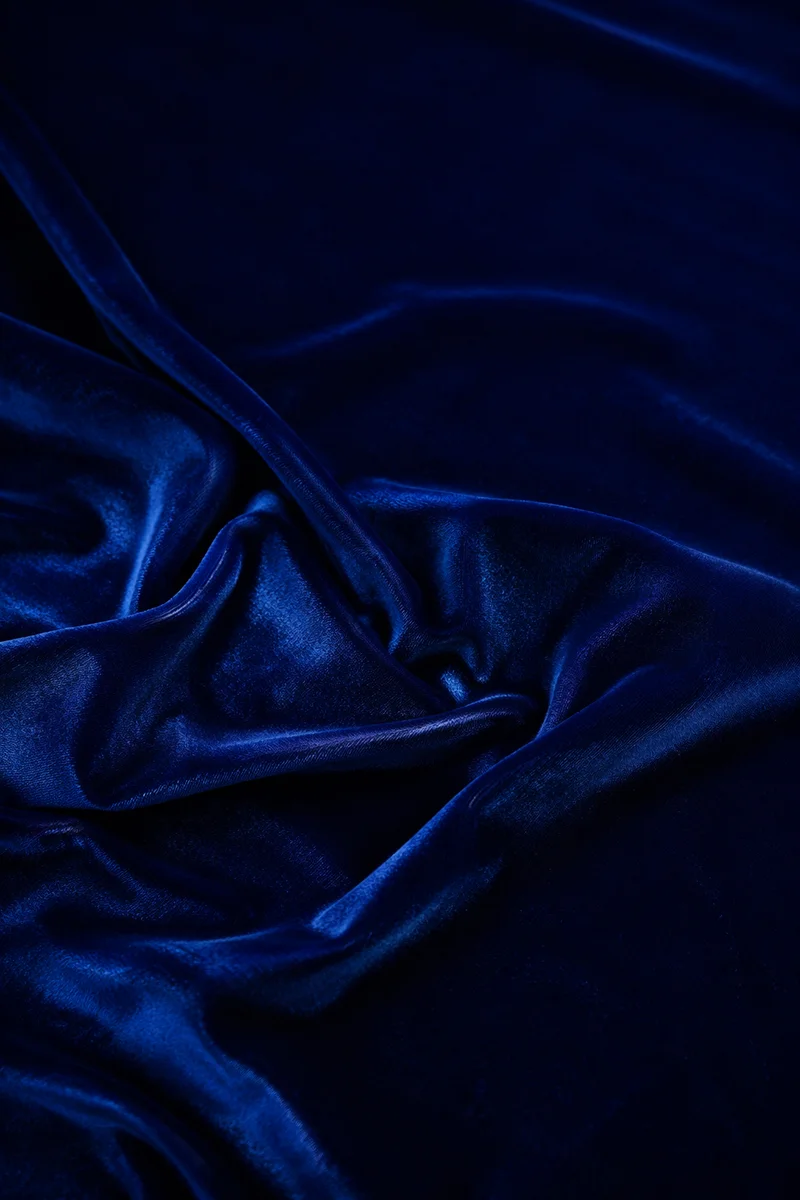 Deep Royal Blue Velvet Draped Background