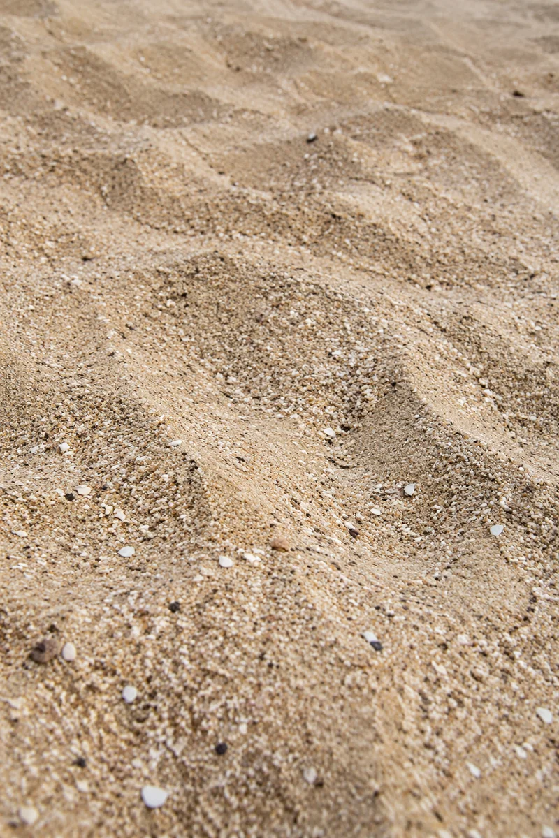 Photorealistic Beach Sand Texture Background