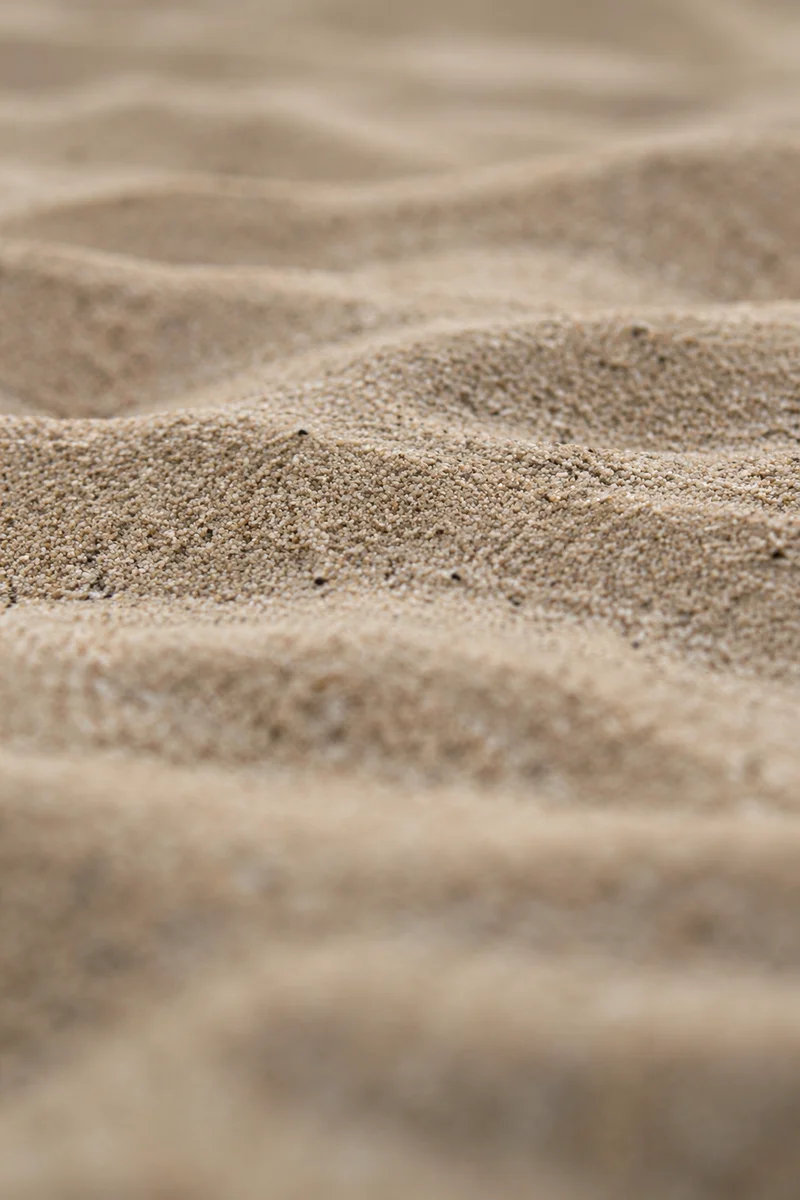 Photorealistic Beach Sand Ripple Texture Background