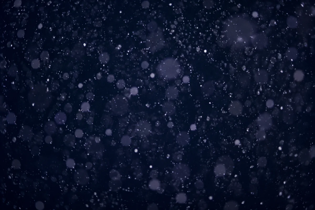 Soft Snowfall on Midnight Christmas Background