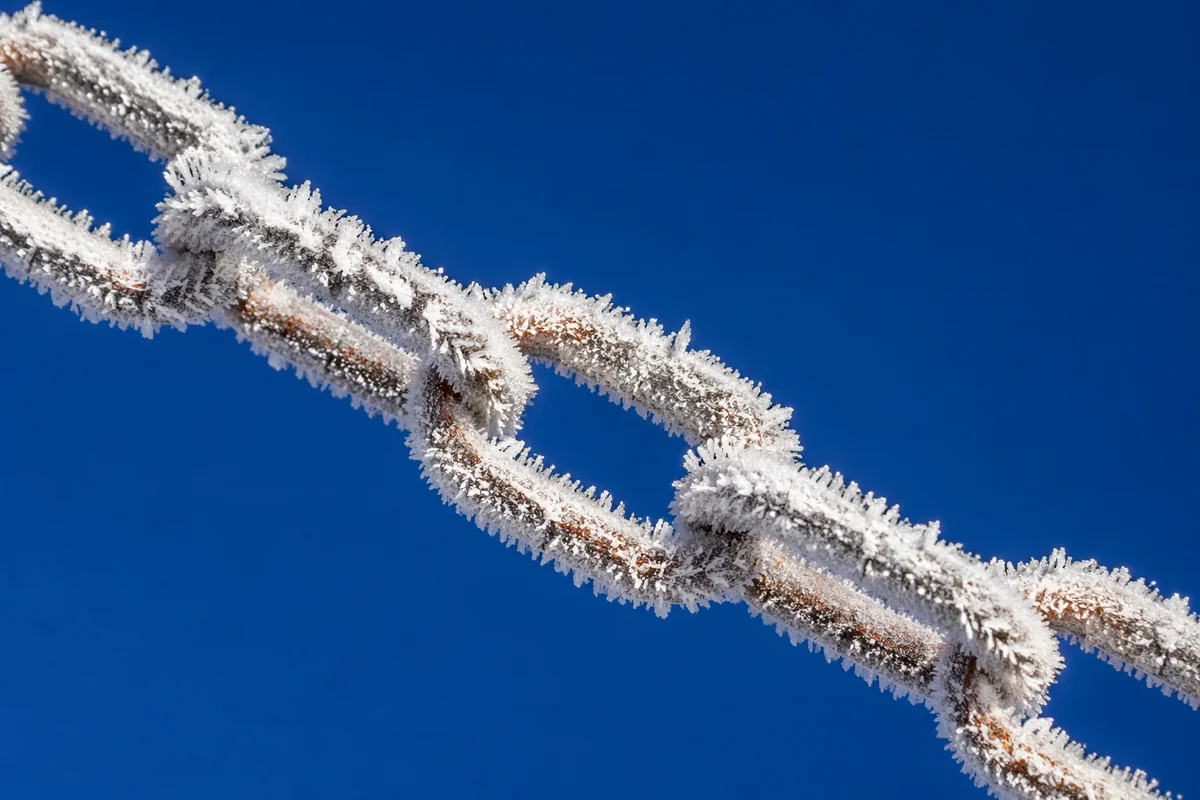 Frosted Chain Against Deep Blue Sky
