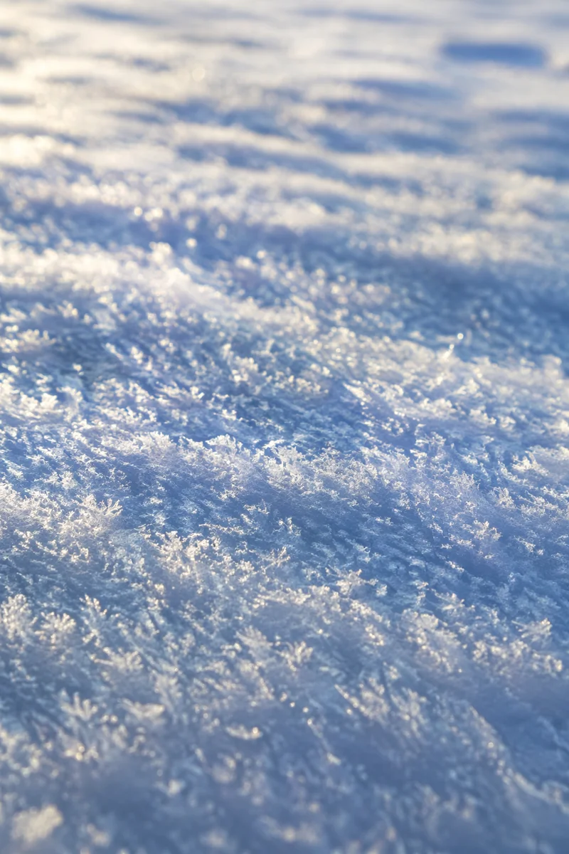 Sparkling Frozen Snow Crystal Texture Background