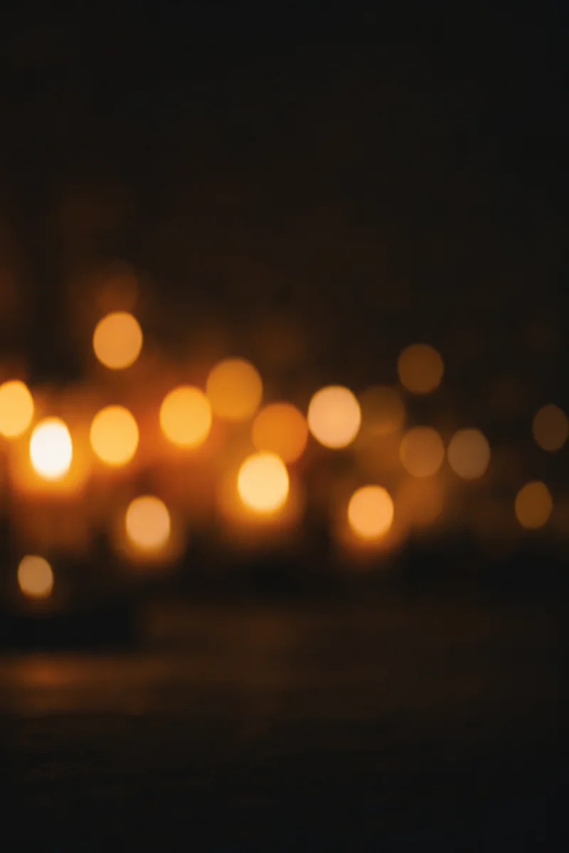 Warm Amber Bokeh Lights on Dark
